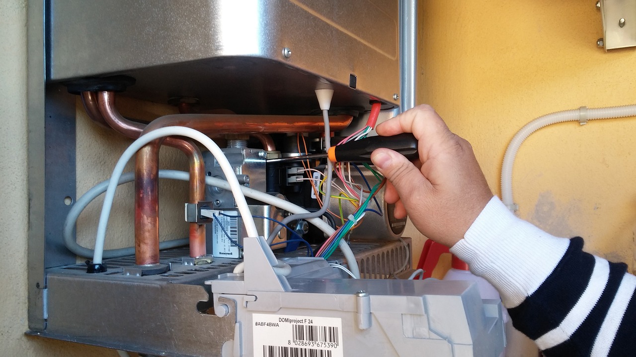 Gas boiling been repaired by a professional. Gas Boiler Repair Dublin
